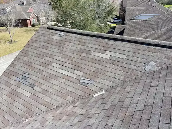 Roof with damaged shingles